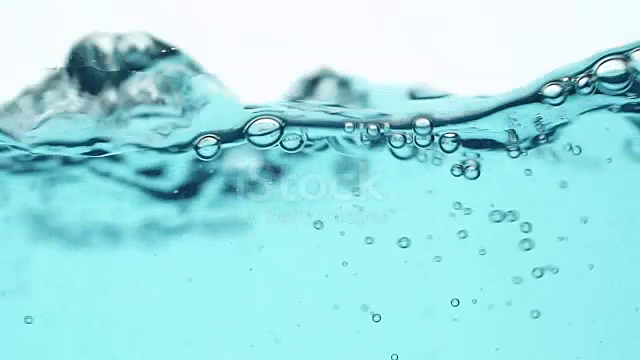slow-motion-shot-water-waves-with-bubbles-70125645